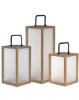 Three wooden solar lanterns with white panels on a white background