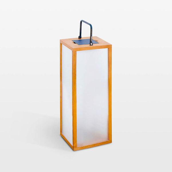 Tall rectangular solar lamp with wooden frame and white glass on a white background
