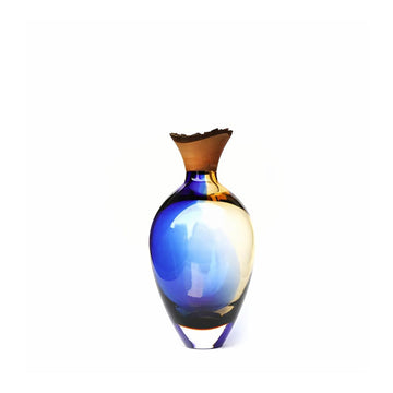Blue and brown glass vase on a white background from Utopia & Utility available at Spacio retail stores in Mumbai & Kolkata. 