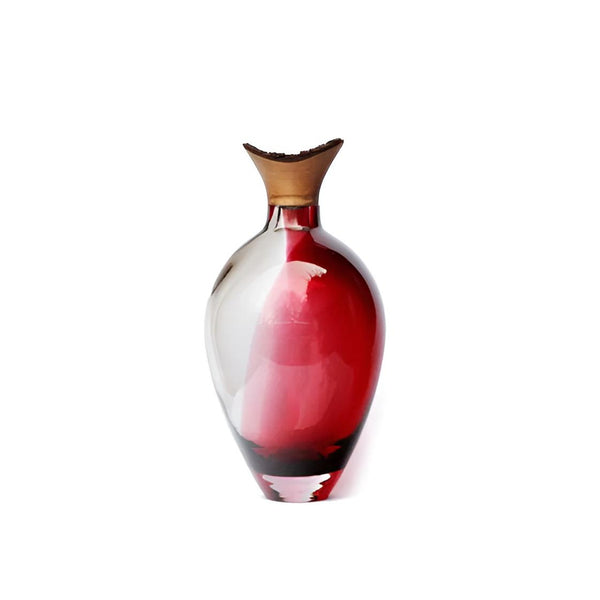 Vase with red and grey colours on a white background from Utopia & Utility available at Spacio retail stores in Mumbai & Kolkata. 