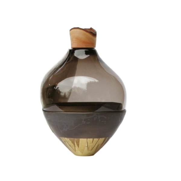 Decorative sculptural vase with a wooden top and base on a white background from Utopia & Utility, available at Spacio retail stores in Mumbai & Kolkata. 