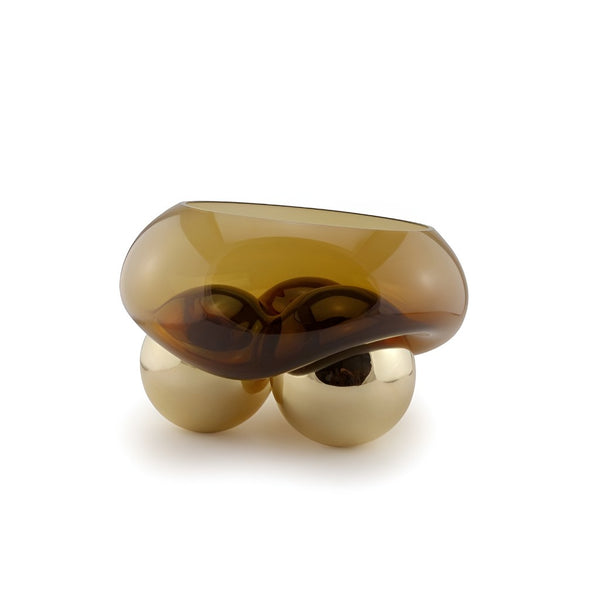 Decorative object with brown and gold elements on a white background