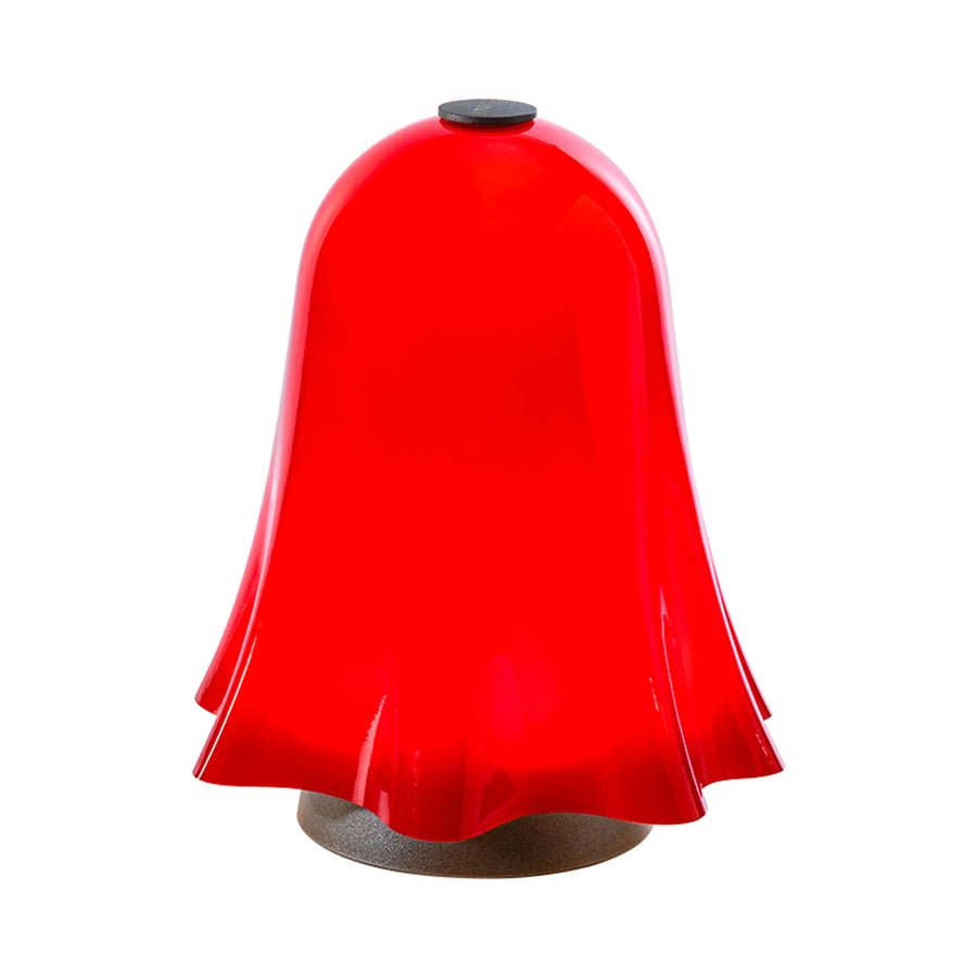 Red bell-shaped lamp on a white background from Venini at Spacio store in Mumbai
