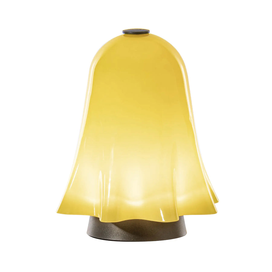 Yellow bell-shaped lamp on a white background from Venini at Spacio store in Mumbai