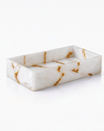 Rectangular white quartz soap dish tray with gold veining on a white background