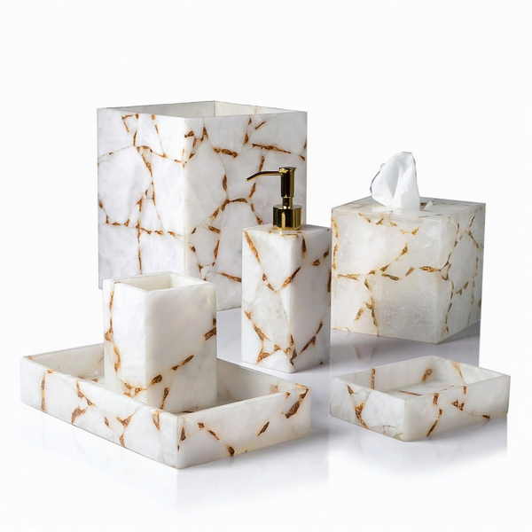 White quartz bathroom accessory set with gold foil on a white background