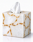 Tissue box cover with gold foil on white quartz pattern on a white background