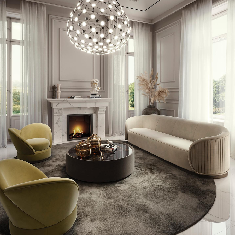 Coleccion Alexandra EOS Round Centre Table in living room interior with sofa set, armchairs & fireplace available at Spacio India for Luxury home decor collection of Indoor Furniture.