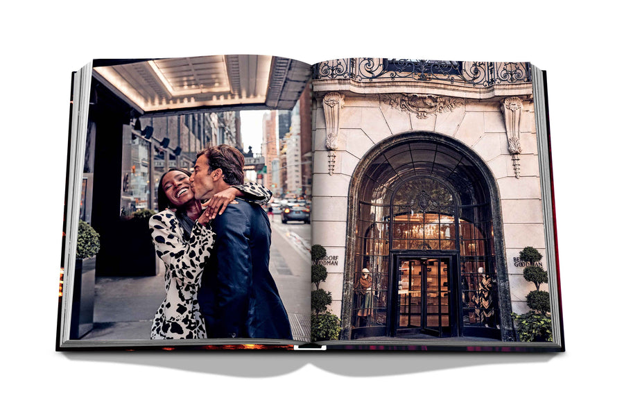 Assouline New York Chic coffee table book displaying photos of Bergdorf Goodman store company & a lovely couple on white back ground available at Spacio India for luxury home decor accessories collection of Travel Coffee Table Books.