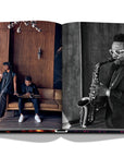 Assouline New York Chic coffee table book displaying photos of man playing Saxophone music instrument on white back ground available at Spacio India for luxury home decor accessories collection of Travel Coffee Table Books.