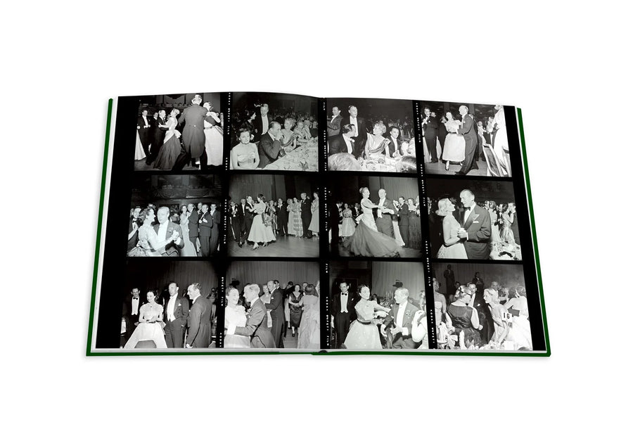 Assouline Bals: legendary costume balls of the twentieth century coffee table book displaying photos of Party ball of people dancing on a white back ground available at Spacio India for luxury home decor accessories collection of Fashion Coffee Table Books.