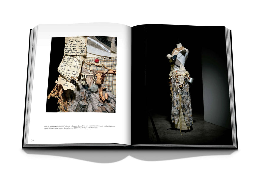 Assouline Dior by John Galliano coffee table book displaying photo of bustier in beige and ecru linen and a pajama-skirt in plaid wool and silk tulle on a white back ground available at Spacio India for luxury home decor collection of Fashion Coffee Table Books.