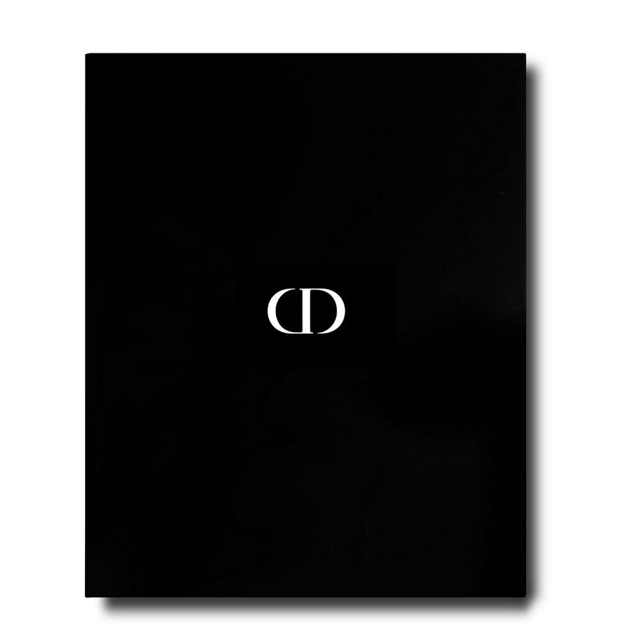 Back cover of Assouline Dior by Marc Bohan coffee table book on a white back ground available at Spacio India for luxury home decor collection of Fashion Coffee Table Books.