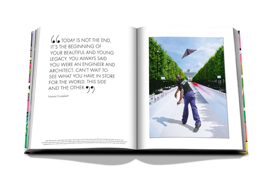 Assouline Louis Vuitton: Virgil Abloh Classic Cartoon Cover coffee table book displaying photo of Virgil Abloh flying a paper plane & quote on a white back ground available at Spacio India for luxury home decor accessories collection of Fashion Coffee Table Books.