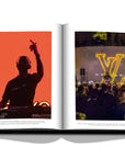 Assouline Louis Vuitton: Virgil Abloh Classic Cartoon Cover coffee table book displaying Image of Virgil Abloh & concert on a white back ground available at Spacio India for luxury home decor accessories collection of Fashion Coffee Table Books.