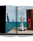 Assouline Louis Vuitton: Trophy Trunks coffee table book displaying image of The America's Cup case was handmade by the Maison's artisans on a white back ground available at Spacio India for luxury home decor accessories collection of Fashion Coffee Table Books.