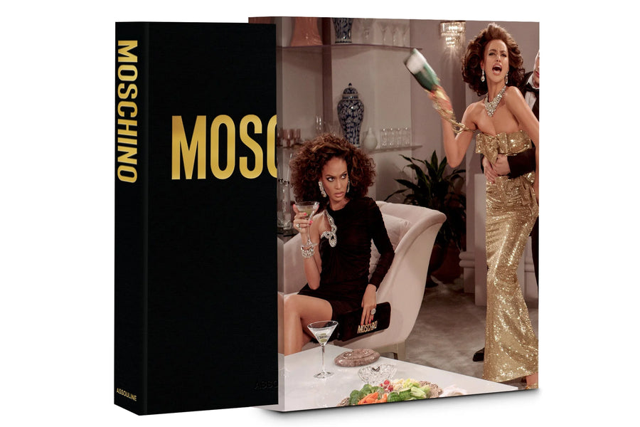 Assouline Moschino coffee table book with its cover on a white back ground available at Spacio India for luxury home decor accessories collection of Fashion Coffee Table Books.