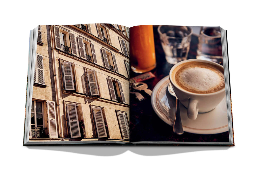 Assouline Paris Chic coffee table book displaying photos of Paris Apartments Windows & Cup of Coffee on white back ground available at Spacio India for luxury home decor accessories collection of Travel Coffee Table Books.