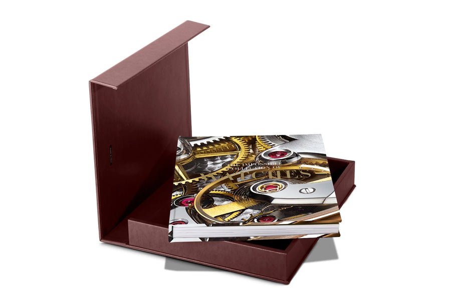 Opened Box of Assouline Coffee Table Book The Impossible Collection of Watches on a white back ground available at Spacio India for luxury home decor accessories collection of Ultimate Coffee Table Books.