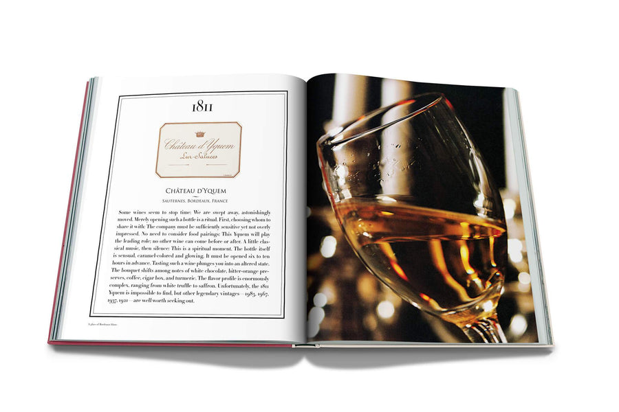 Assouline Coffee Table Book The Impossible Collection of Wine Limited Edition page displaying photo of close view of wine glass on a white back ground available at Spacio India for luxury home decor accessories collection of Ultimate Coffee Table Books.