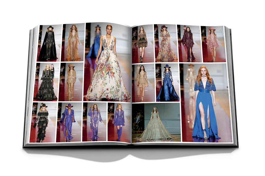 Assouline Zuhair Murad coffee table book cover with page of fashion models on white back ground available at Spacio India for luxury home decor accessories collection of Fashion Coffee Table Books.