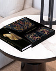 Assouline Zuhair Murad coffee table book cover on round side table with other accessories available at Spacio India for luxury home decor accessories collection of Fashion Coffee Table Books.