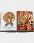 Open book with illustrations of a wooden elephant toy and a colorful striped background.