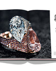 Assouline G Glenn: Spiro the art of a jewel coffee table book displaying photo of rose gold diamond ring with sketches on a white back ground available at Spacio India for luxury home decor collection of Jewellery Coffee Table Books.