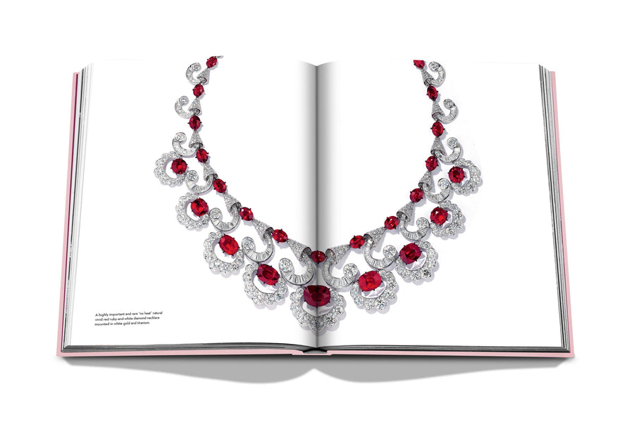 Assouline G Glenn: Spiro the art of a jewel coffee table book displaying photo of Red Diamonds Necklace on a white back ground available at Spacio India for luxury home decor collection of Jewellery Coffee Table Books.