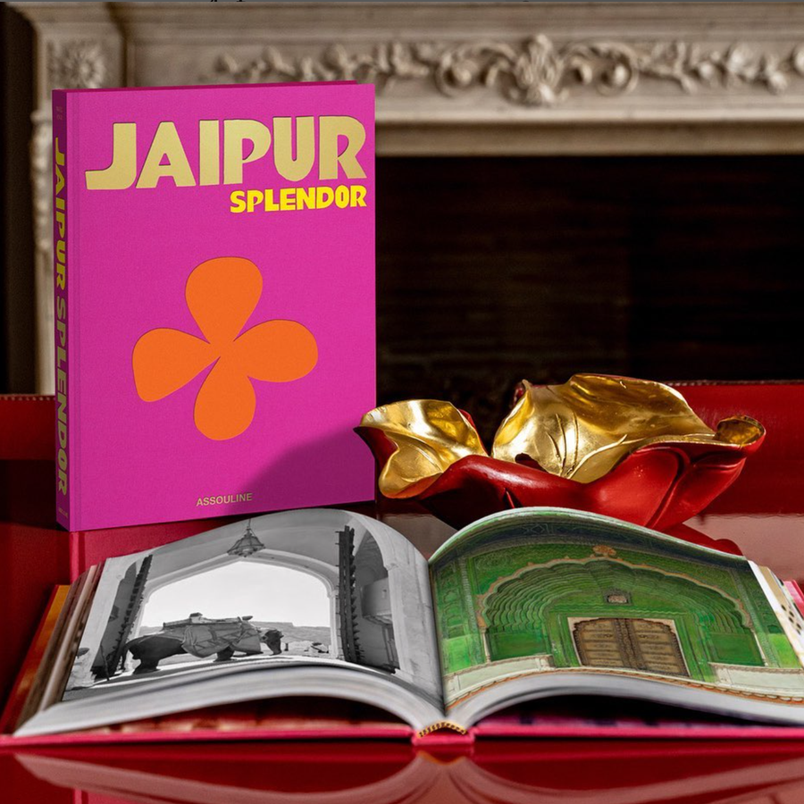 Assouline Jaipur Splendor coffee table book on a coffe table with other book & Bowl available at Spacio India for luxury home decor accessories collection of Travel Coffee Table Books. 