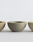 Three FRP bowls of varying sizes on a white background