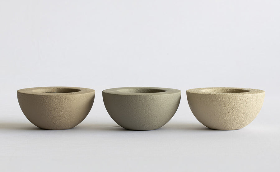 Three FRP bowls of varying sizes on a white background