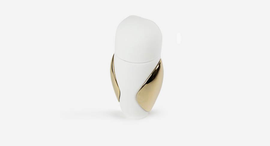 A white and gold Bosa Barns The Owl bottle on a white surface, part of the Owls collection designed by Manolo Bosa.