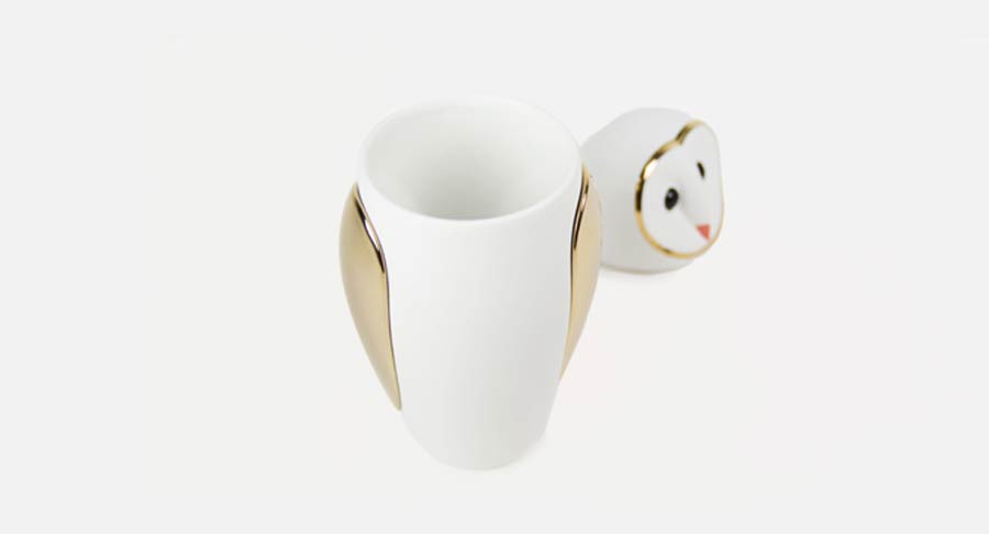 A Bosa Barns The Owl mug on a white surface, perfect for your Owls collection.