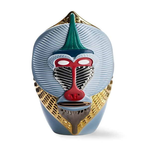 Decorative mask with geometric design on a white background