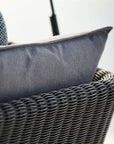 Cushion close up Cave Swing Sofa by Cane-line, designed by Jesper K. Thomsen, featuring a modern canopy design, soft cushions, and weather-resistant materials for indoor and outdoor use.