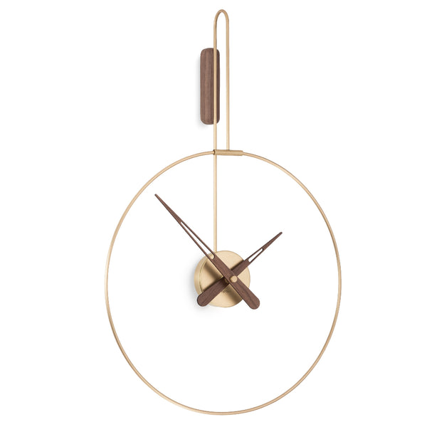 A Nomon Clock Nomon Micro Daro G Walnut MDADN hanging on a white wall in luxury interiors.