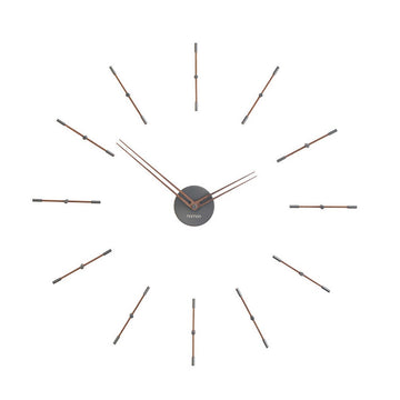 An elegant Nomon clock with metal rods on a white background.