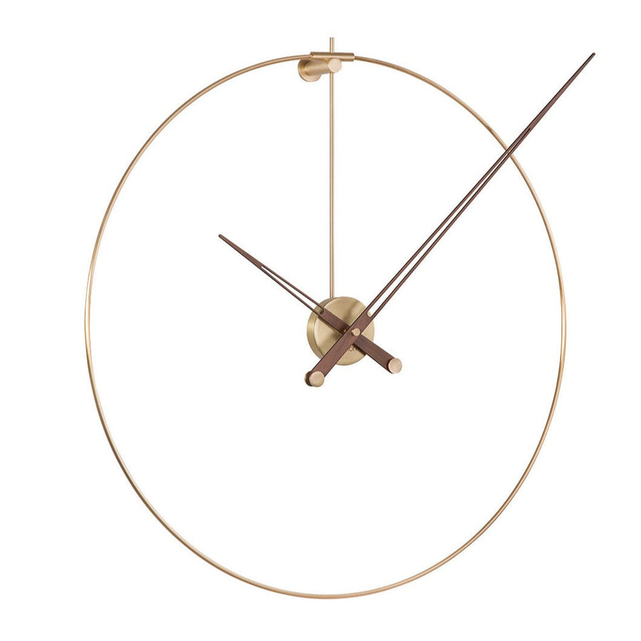 A Clock Nomon New Anda Gold NADN with a brass structure.