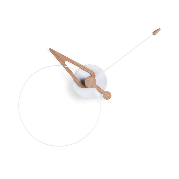 Modern wall clock with wooden design on a white background  from Nomon available at Spacio retail stores in Mumbai & Kolkata and online. 