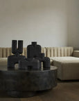 A 101Cph Cobra Double Medio Coffee 211037 coffee table in a living room with a hand glazed couch. (Brand Name: 101 Copenhagen)