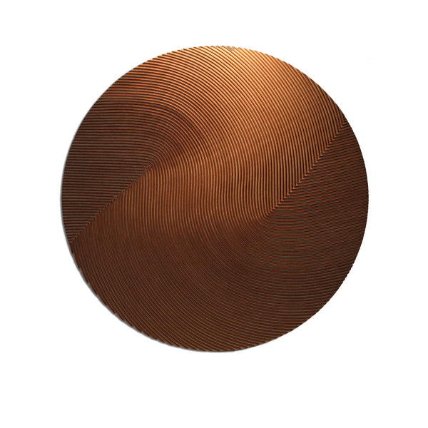 Brown circular wall art with textured surface on a white background