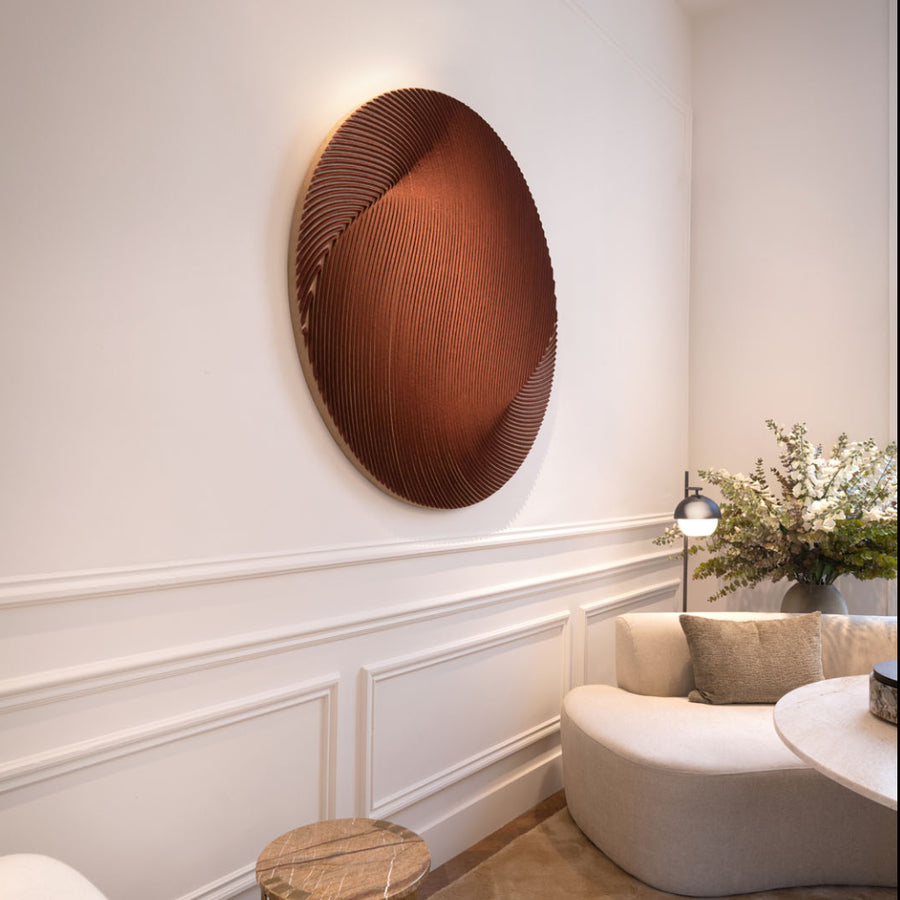 Decorative sculptural wall art piece on a white wall with a modern interior setting by Gardeco available at Spacio retail stores in Mumbai & Kolkata.  