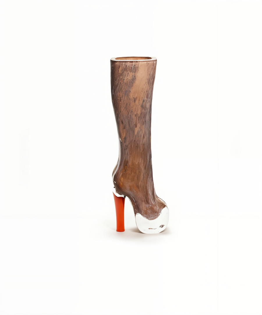 Luxury glass vase shaped like a high heel boot in vibrant orange from Henry Dean, hand made in Belgium, available at Spacio India for artistic home styling