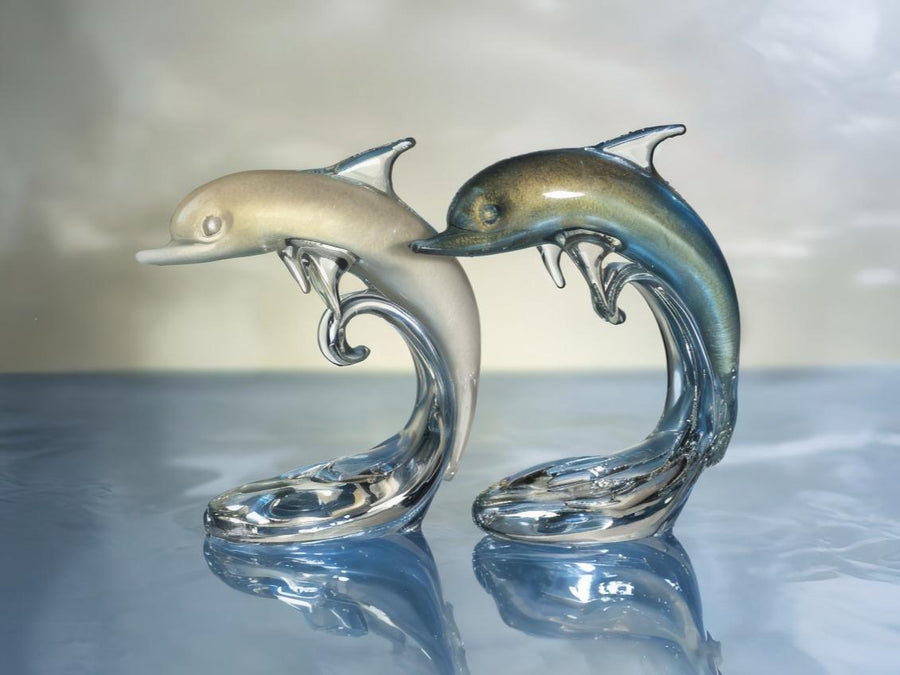 Set of Dolphin Baby On The Wave crystal centerpieces in white-gold and ocean-blue by Duccio Di Segna – luxury decor collectibles at Spacio India.