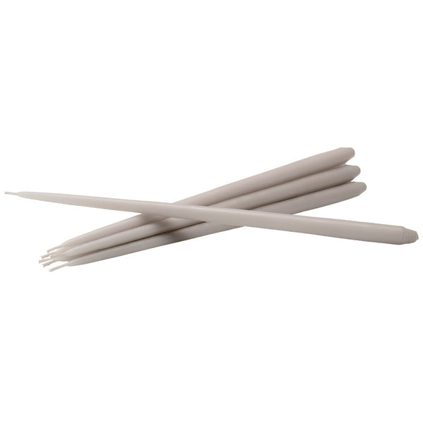 Six slim, light beige sticks, likely wax sticks or applicator sticks, arranged in a crossed pattern on a solid white background by Ester & Erik, available at Spacio in India.