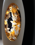 A Fos Ceramiche Falling in Love Gold Vase (Pair) with butterflies in it by Enea Mazzotti.