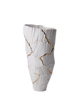 The Fos Ceramiche Meltemi Vase showcases Fos Ceramiche craftsmanship, featuring a white design adorned with subtle gold accents. Its luxurious and artistic appeal adds elegance to any space.