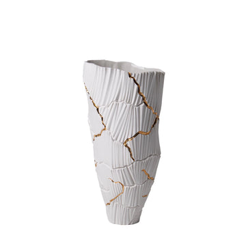 The Fos Ceramiche Meltemi Vase showcases Fos Ceramiche craftsmanship, featuring a white design adorned with subtle gold accents. Its luxurious and artistic appeal adds elegance to any space.