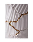 The Fos Ceramiche Meltemi Vase, created by the brand Fos Ceramiche, showcases a perfect blend of luxury and artistry with its white and gold design. This exquisite piece is crafted with exceptional Italian craftsmanship, featuring intricate details.